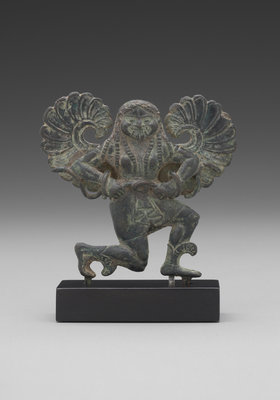 Statuette Of A Running Gorgon