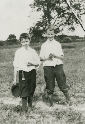 Jarvis Rockwell and Norman Rockwell Holding Frogs on a Farm in Warwick, New York