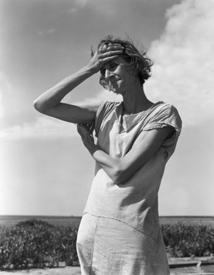 Wife of a migratory laborer with three children. Near Childress, Texas. Nettie Featherston