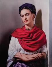 Frida Kahlo wearing a magenta rebozo