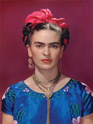 Frida Kahlo wearing a blue satin blouse