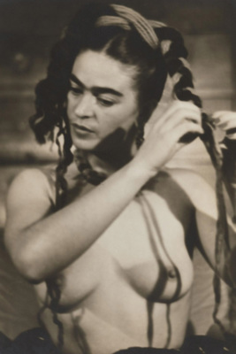 Frida Kahlo unbraiding her hair