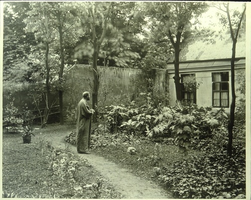 Gustav Klimt standing in the garden of his studio on the Josefstadter Strasse