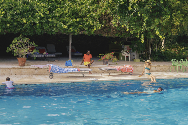 Untitled (Jazzique and his family at the pool), Golden Rock Inn, from the series Postcards From The Future