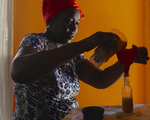 Mother making hot sauce, from Everyday Is Another Chance series 