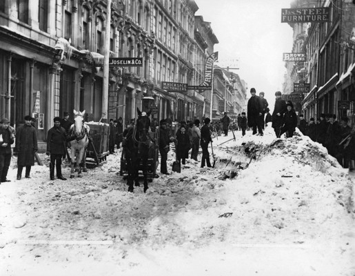 Clearing snow on Notre Dame Street