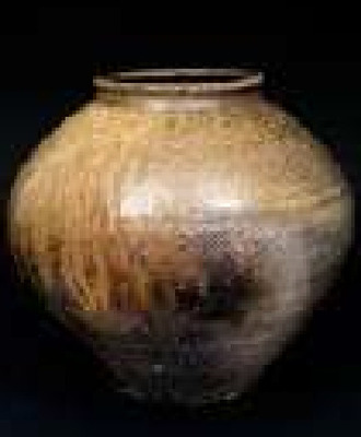 Unglazed Pot Fired in Anagama Kiln with Carbonization and Color Variation During Firing