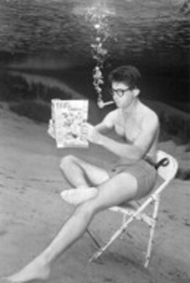Man Reading the November 1956 Florida Outdoors Magazine Underwater at Silver Springs